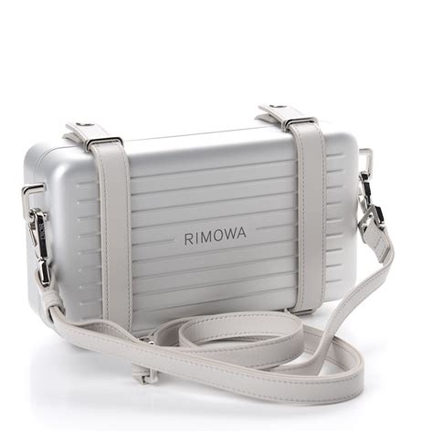 christian dior silver strap clutch.